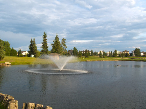 water hazard with fountain at The Links at Spruce Grove