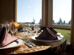 table set for a banquet at The Links at Spruce Grove