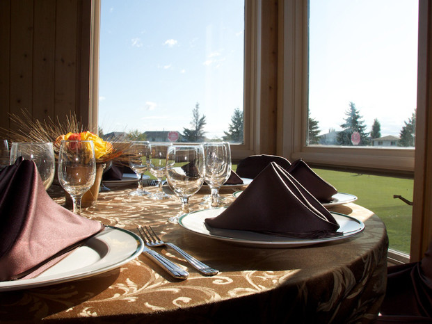 table set for a banquet at The Links at Spruce Grove
