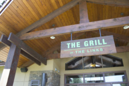 sign outside of The Grill at The Links at Spruce Grove